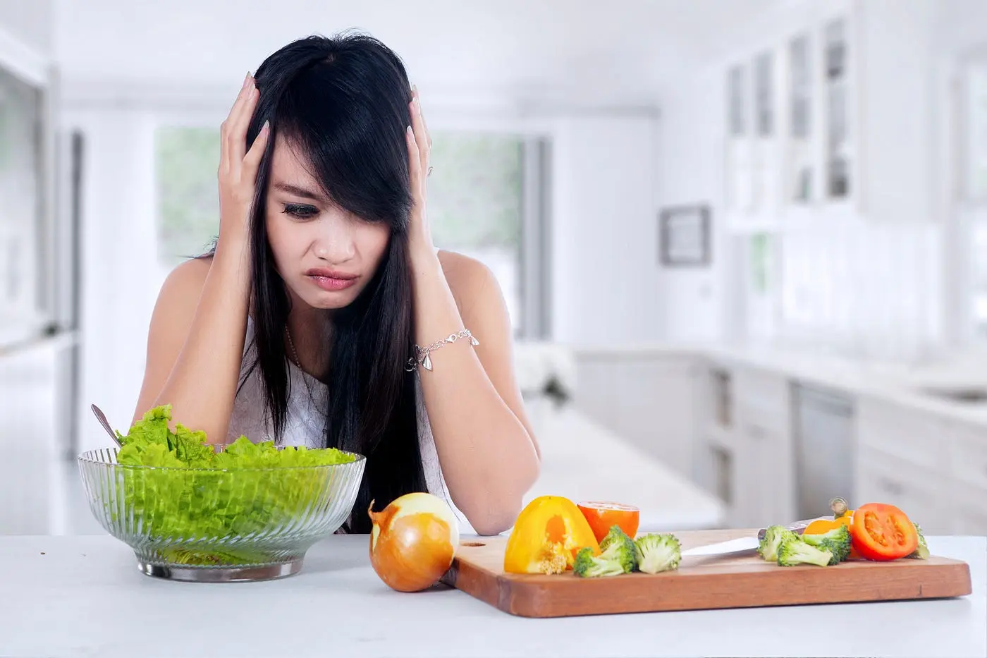 A pregnant woman experiencing food aversion