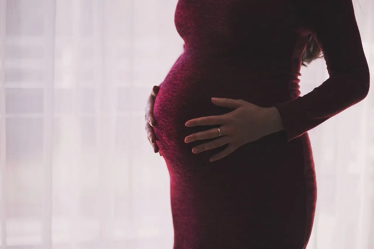 Pregnant woman enjoying a healthy meal